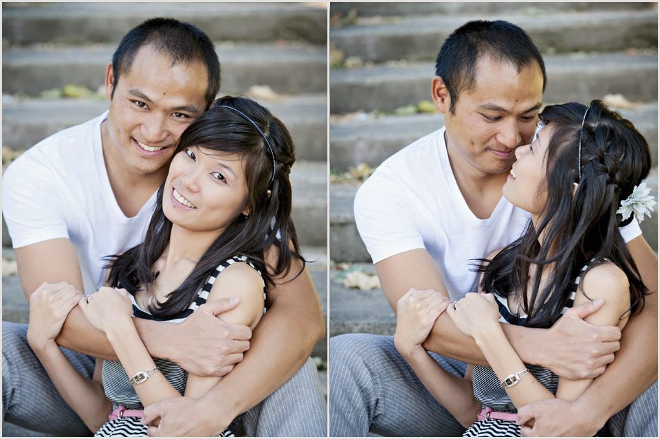 couple hugs on the steps of Cathedral park in Portland