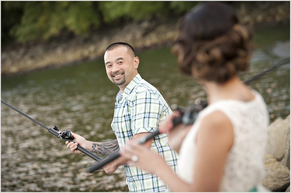 man looks at his fiancé during engagement photo session