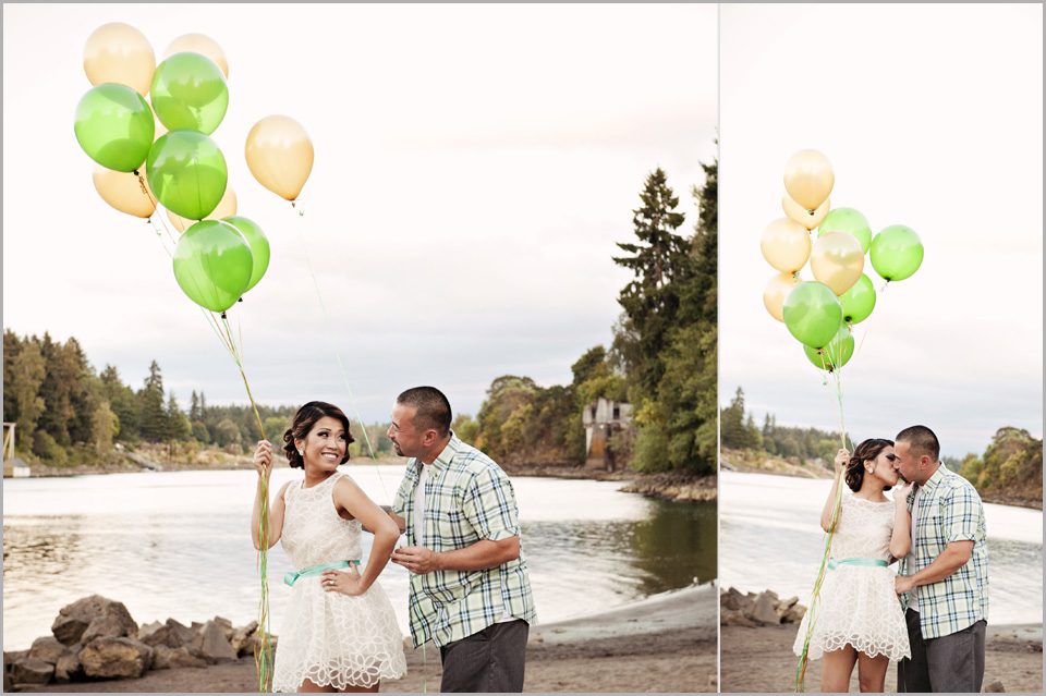 couple kiss in Lake Oswego while holding balloons