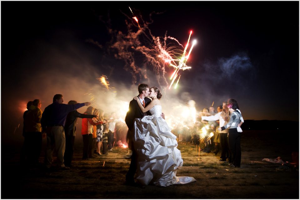 bride and groom with fireworks