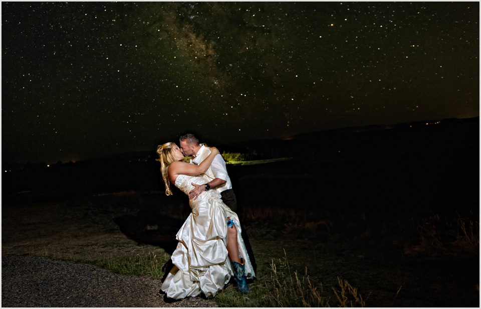 bride and groom with stars at night