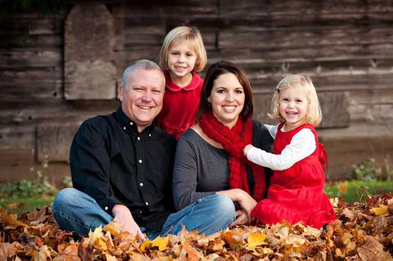 fall family portrait session with red outfits