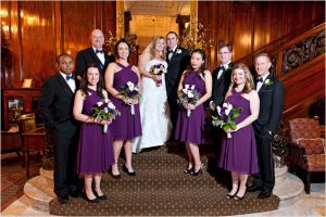 wedding party on the stairs at the benson